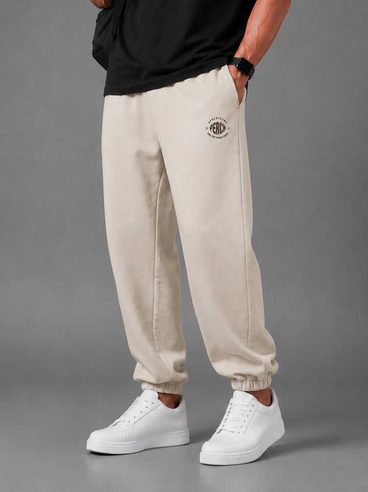 Beige Solid Relaxed Fit Elastic Cotton Jogger