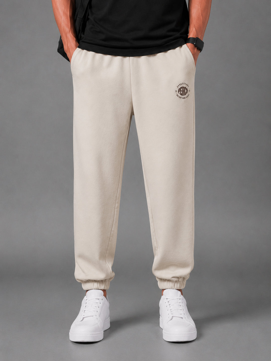 Beige Solid Relaxed Fit Elastic Cotton Jogger